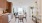 a kitchen with a dining table and chairs