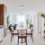 a kitchen with a dining table and chairs