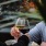 two people sharing a glass of wine